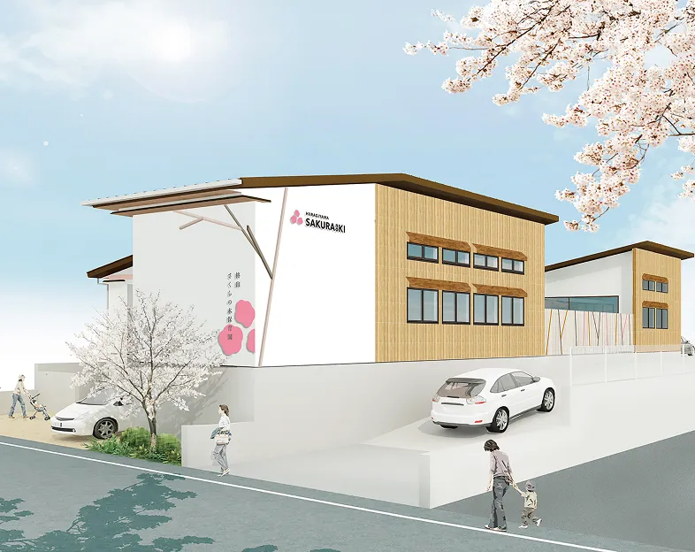 子供たちが園庭で楽しく遊んでいる写真